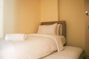 Best Strategic 2BR Apartment at Green Palm Residence By Travelio